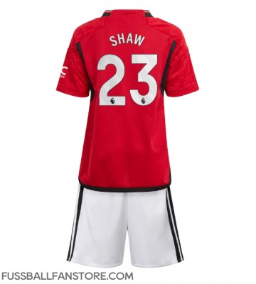 Manchester United Luke Shaw #23 Replik Heimtrikot Kinder 2023-24 Kurzarm (+ Kurze Hosen)
